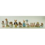 A collection of Beswick Beatrix Potter figures: Beswick gold marked Beatrix Potter figures