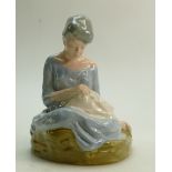 Irish Wade figure: Irish Wade porcelain Seagoe Ceramics figure of seated woman, height 21.5cm.