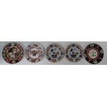 A collection of 19th century ironstone plates: 19th century plates by Spode,