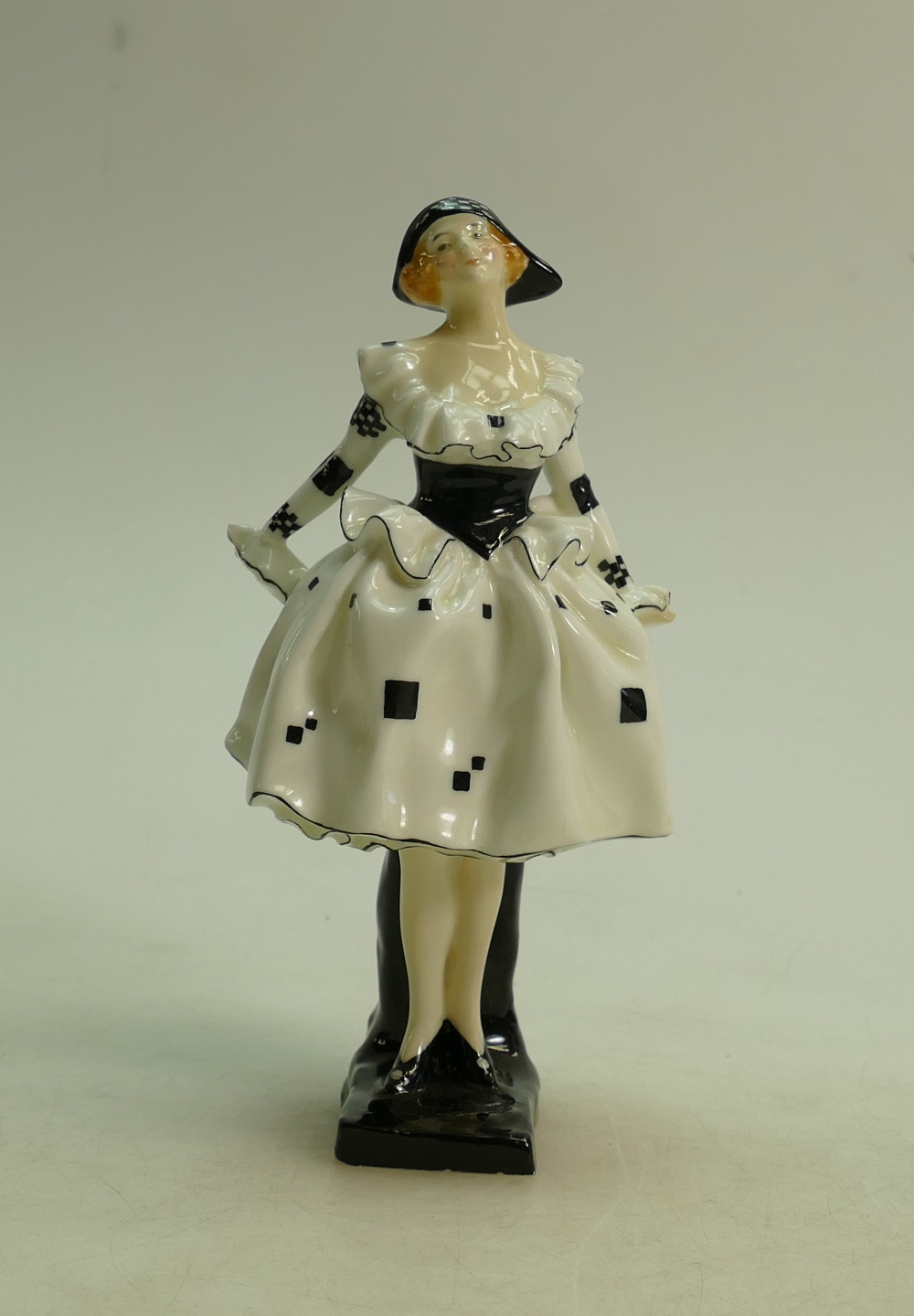 Royal Doulton figure Harlequinade HN711: Early figure dated 1928.