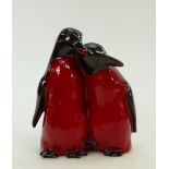Royal Doulton Flambe model of pair of penguins: Royal Doulton Flambe pair of huddling penguins,