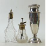 A collection of Silver items: Silver vase and silver topped scent bottles.