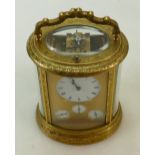 Large oval French Carriage Clock, quarter repeating, striking,