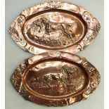Arts & Crafts hand beaten Copper Trays: Two copper trays with hunting scenes central,