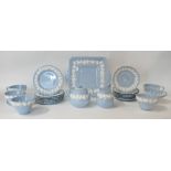 Wedgwood Queensware tea set, white on blue.