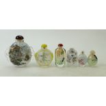 A collection of Chinese glass perfume bottles: Collection of Chinese perfume bottles decorated with