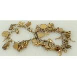 9ct gold Charm Bracelet: 9ct gold charm bracelet with additional loose charm.