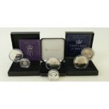 6 QEII Coins silver and plated inc some £5: Six QEII coins all in capsules, 3 cased also,