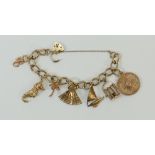 9ct gold Charm Bracelet with 7 charms: 9ct gold charm bracelet with 7 charms, 31.