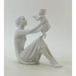 Kaiser Parian figure of a woman with child: Height 23cm.