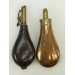 19th century Powder Flasks: 19th Century brass powder flask and another leather and brass example.