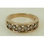 9ct gold Diamond Ring: 9ct gold ring set with 6 small diamonds, 5.4 grams.