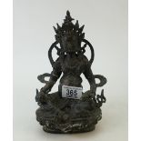 An old bronze figure of an oriental Deity: An old bronze figure of an oriental Deity