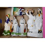 A collection of 5 20th Century Staffordshire type figures: cricket theme items noted,
