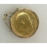 Gold FULL sovereign 1905 in 9ct gold mount 9.