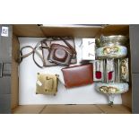 A mixed collection of items to include: Rotating Musical Cigar dispenser, carriage clocks,