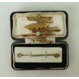 collection of gold brooches & pins: collection of six gold coloured metal brooches,