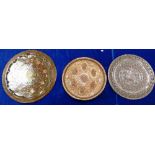A collection of 3 embossed & decorated copper and base metal plaques: diameter of largest 59cm(3)