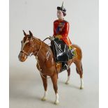 Beswick model of Queen Elizabeth II: 1546 mounted on chestnut horse, trooping the colour.