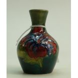 Moorcroft small vase: Moorcroft 1950s small vase decorated in the hibiscus design,height 9.5cm.