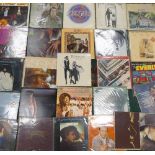 A collection of 1970's & later LP's to include: The Stray Cats, Simon & Garfunkel, Fleetwood Mac,