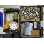 A mixed collection of items to include: loose cutlery, boxed glassware,