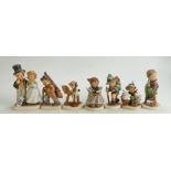 A collection of Goebel figures to include: Flower Vendor, Cinderella, Playmates, Cellist,