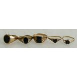 A collection of 9ct gold signet rings set with black onyx stones, 9.8 grams.