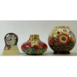 Two Old Tupton vases: together with a mantle clock