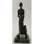 A bronzed stylized figure of Mother & Child: A bronzed stylized figure of Mother & Child