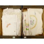 A large collection of vintage linen: including table cloths, lace items many with decorative