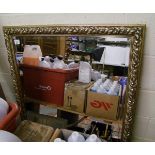 A large framed mirror: in a gild frame Height 115 x 90 wide
