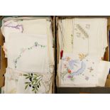 A large collection of vintage linen: including table cloths, lace items many with decorative