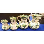 A set of four Masons chartreuse patterned graduated jugs(4):