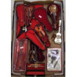 A collection of cased miniature musical instruments: mainly violins (1 tray).