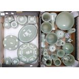 A large collection of green Wedgwood jasper ware: to include a fruit bowl, planters, candlestick