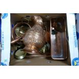 A mixed collection of copper items to include: hand beaten jugs, storage pots, horse brasses etc