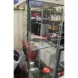 A tall glass display cabinet: with lighting 165cm x 43 x 37