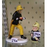 A Coalport Firefighter figure: plus a Royal Doulton Fred Fearless Doultonville toby jug (2).