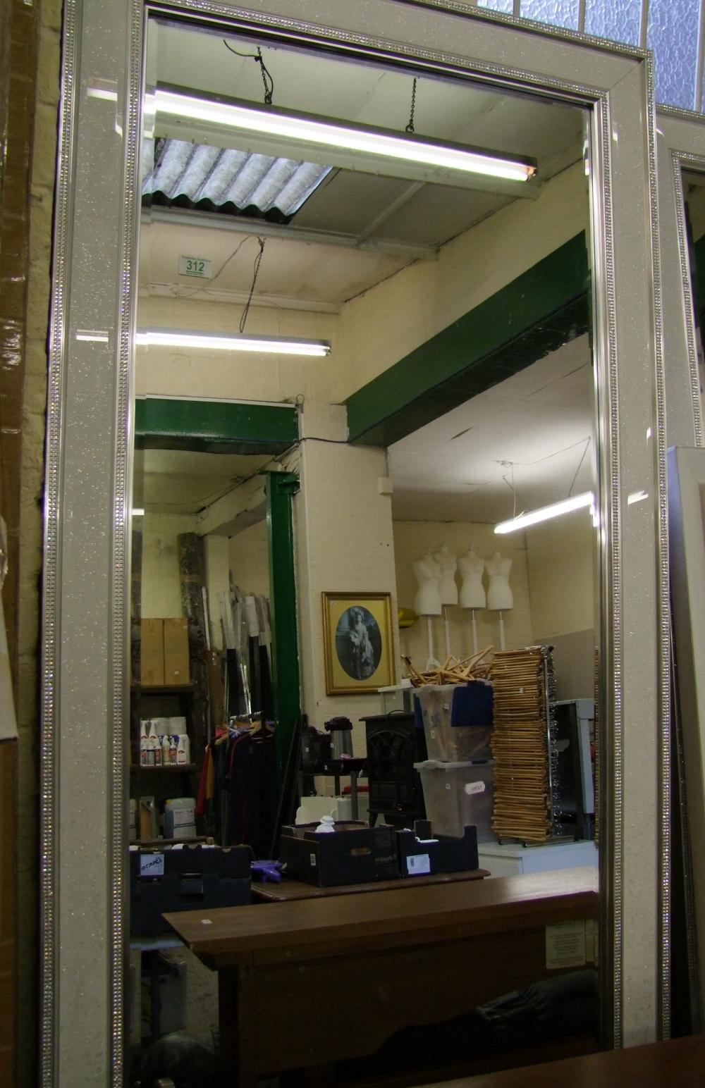 A large modern beval edge mirror: 173 cm x 180