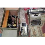 A Lexicon 80 vintage typewriter: plus a cased Eumic P8 projector and a cased Jones sewing machine (