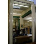 A large modern beval edge mirror: 173 cm x 180