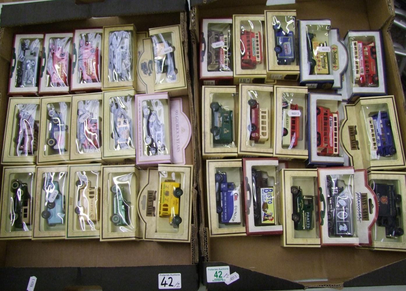 A large collection of Lledo boxed vehicles: including vans and buses (2 trays).