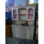 Cream painted cottage dresser with glazed cupboards above drawers & cupboards