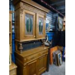 Victorian carved oak bookcase with leaded glass top above cupboards, 124.5cm Key in Office