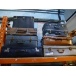 8 Various vintage suitcases