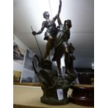 Spelter model of male and female in industrial setting on hardwood base