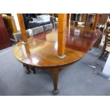 A late Victorian mahogany extending dining table with four leaves on turned legs, 352cms