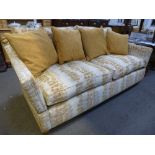 A Modern Knole style sofa with foxglove pattern on square tapered legs 211cms