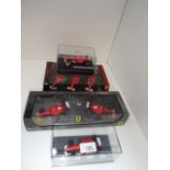 4 boxed 'Hotwheels' sets of Ferrari F1 racing cars.